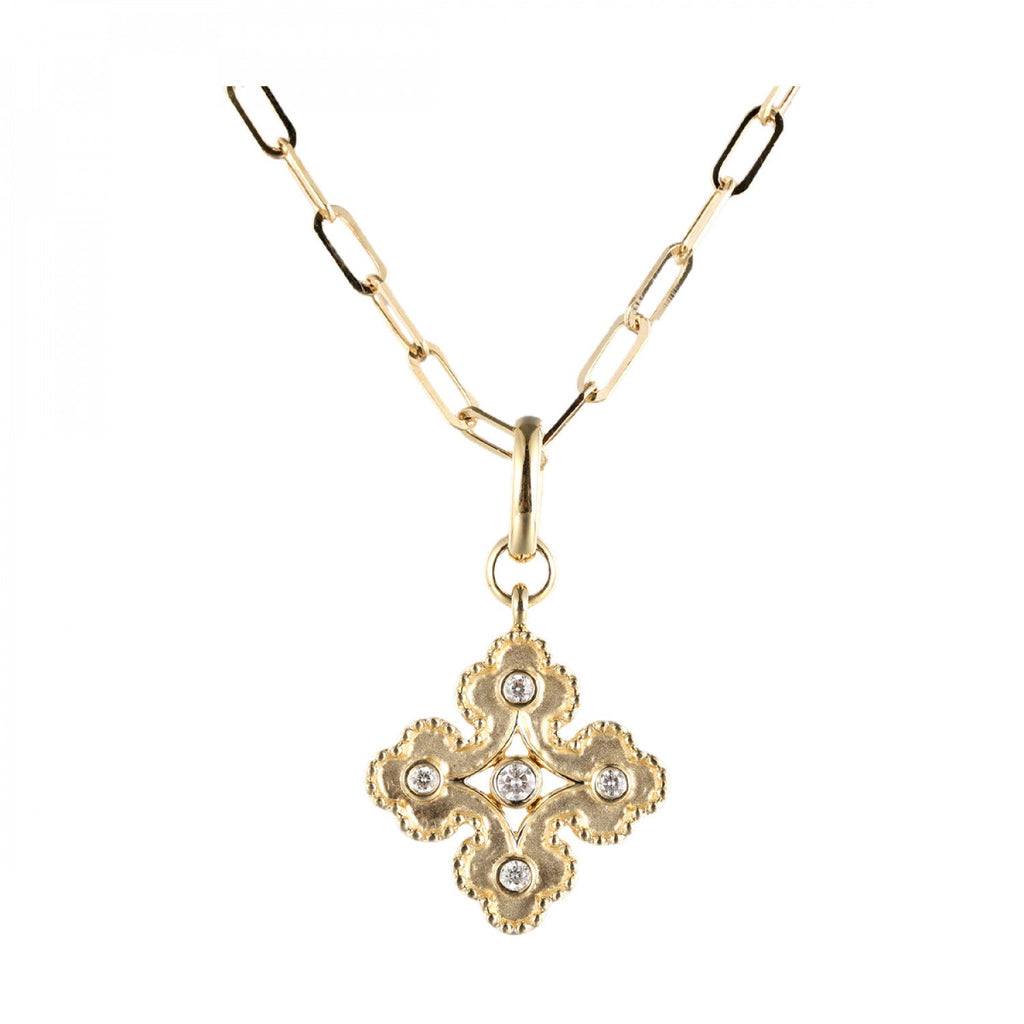 Yellow gold necklace with diamond cross pendant.