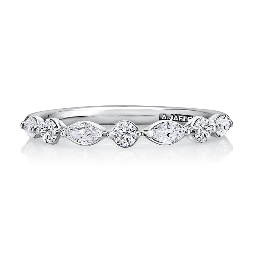 Rose gold band with various shaped diamonds.