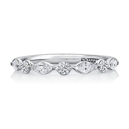 Rose gold band with various shaped diamonds.