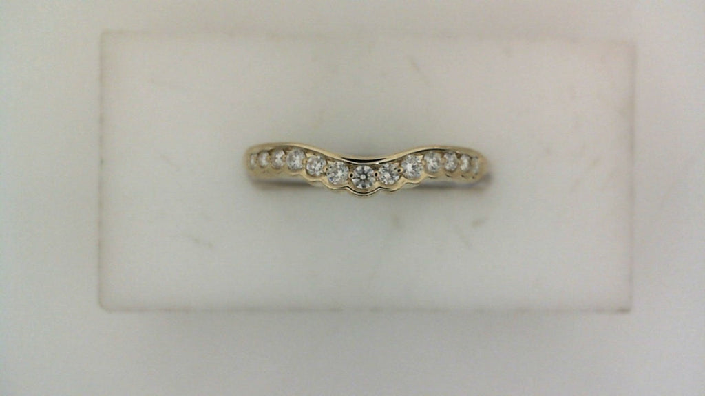 Contour yellow gold band with round diamonds.