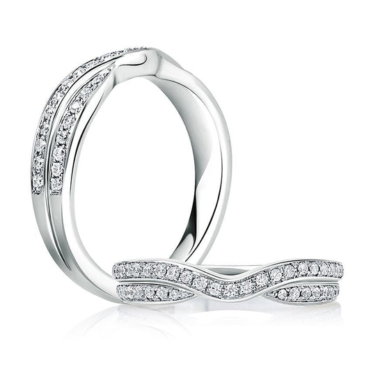 Stackable diamond band in white gold.