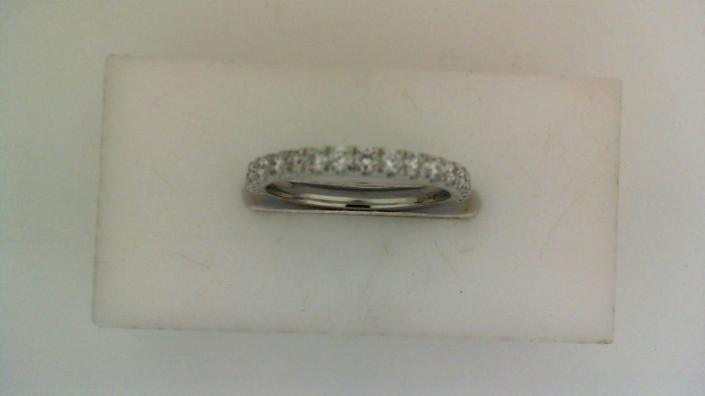 Platinum diamond band with round stones.