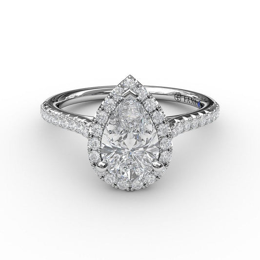 Pear-shaped diamond halo engagement ring.