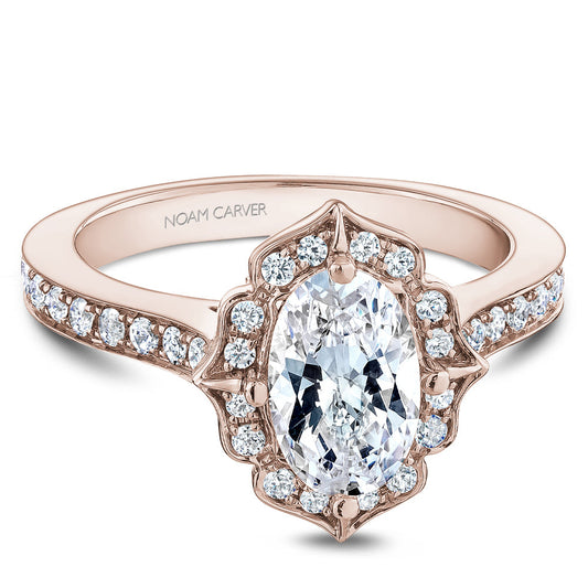 Rose gold ring with vintage halo diamonds.