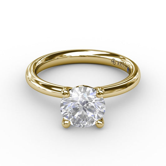 14K yellow gold ring with round diamond.