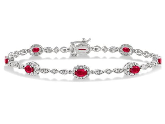 Oval ruby and diamond station bracelet.