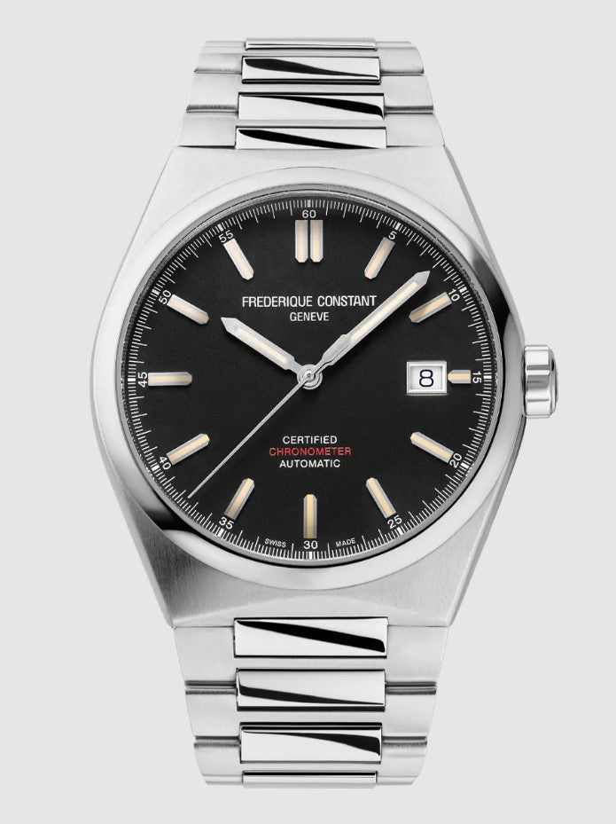 Stainless steel watch, black dial, silver markers.