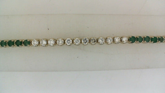 Emerald and diamond tennis bracelet.