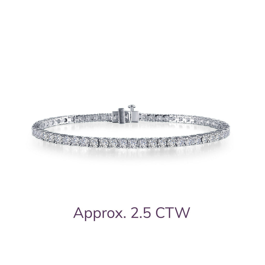 Platinum tennis bracelet with simulated diamonds.