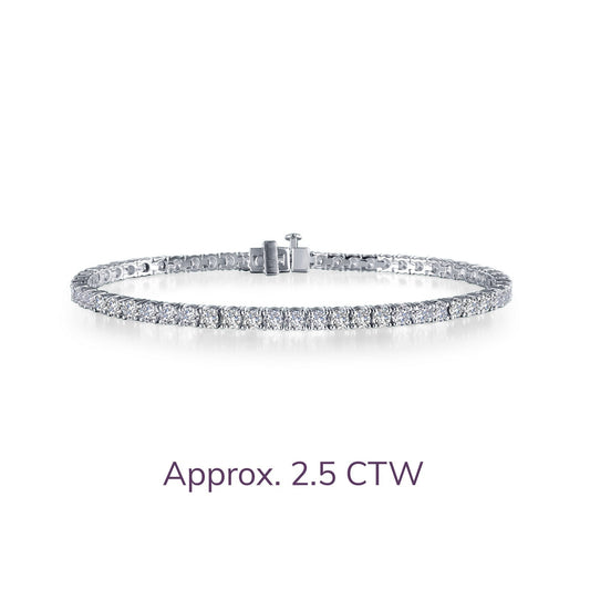 Platinum tennis bracelet with simulated diamonds.