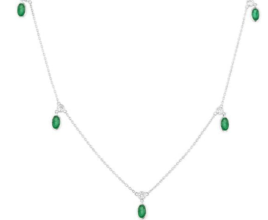 Oval emerald station necklace, white gold chain.