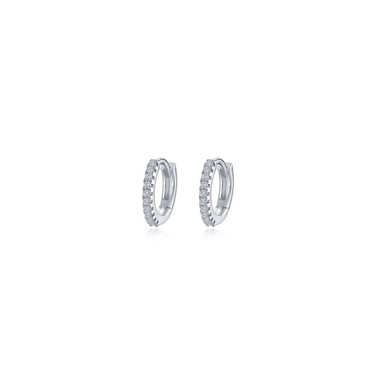 Simulated diamond huggie earrings in platinum silver.
