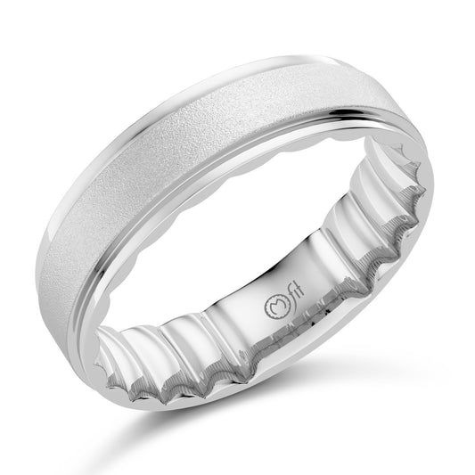 Polished satin white gold carved band.
