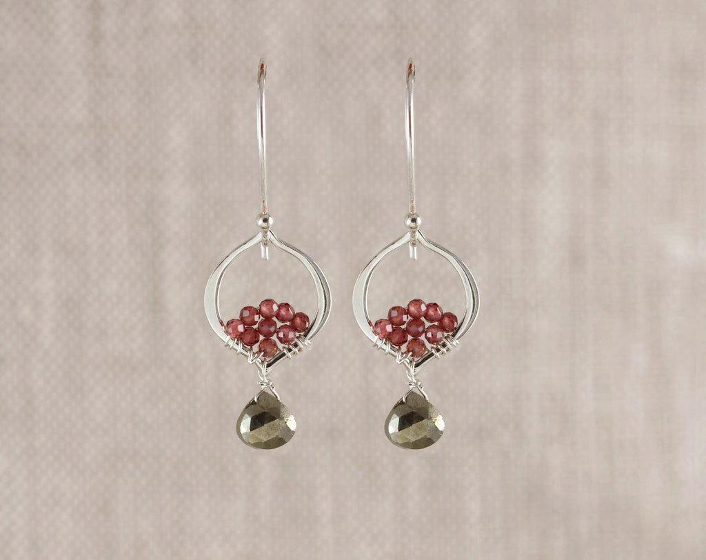 Sterling silver earrings with pyrite, garnet accents.