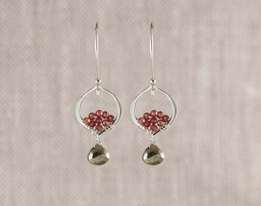 Sterling silver earrings with pyrite, garnet accents.