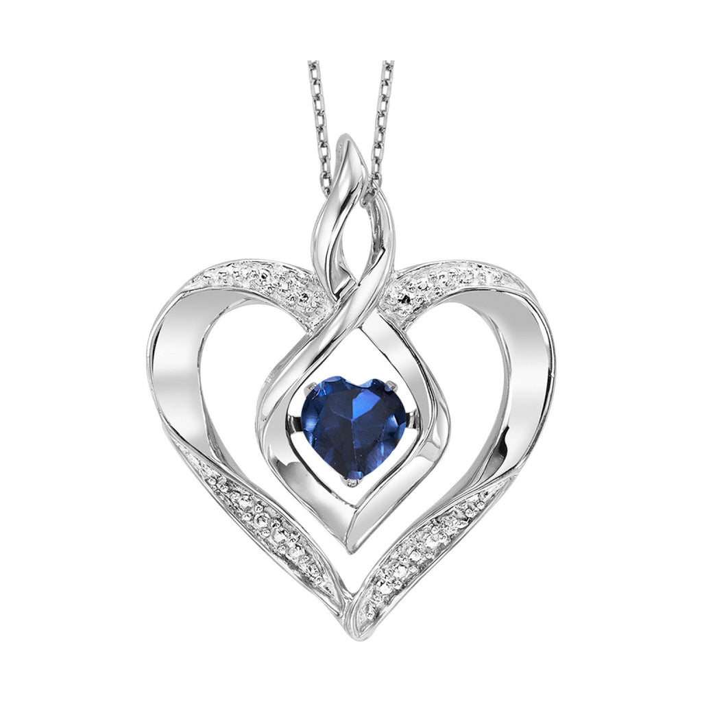 Heart-shaped sapphire necklace in sterling silver.