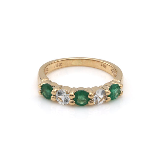 14K gold band with emeralds and sapphires.