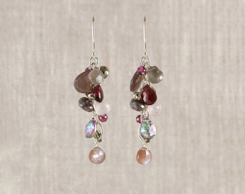 Sterling silver earrings with colorful gemstones.