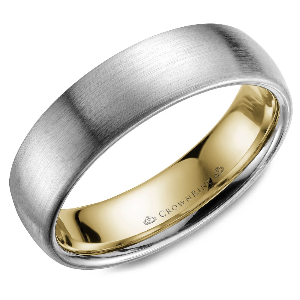 Satin finish white-yellow gold carved band.