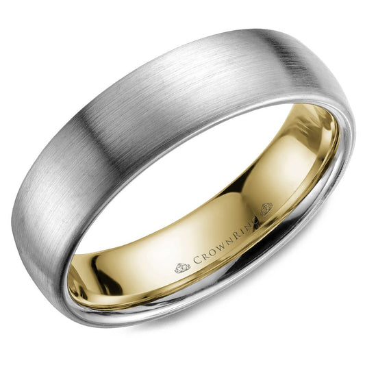 Satin finish white-yellow gold carved band.