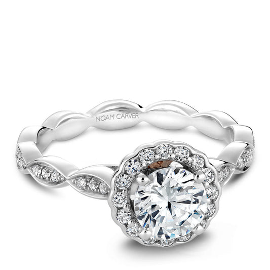 Halo diamond ring with twisted band design.