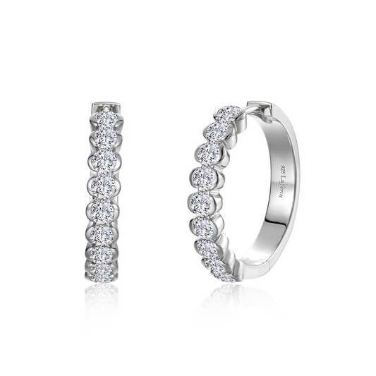 Platinum hoop earrings with round simulated diamonds.