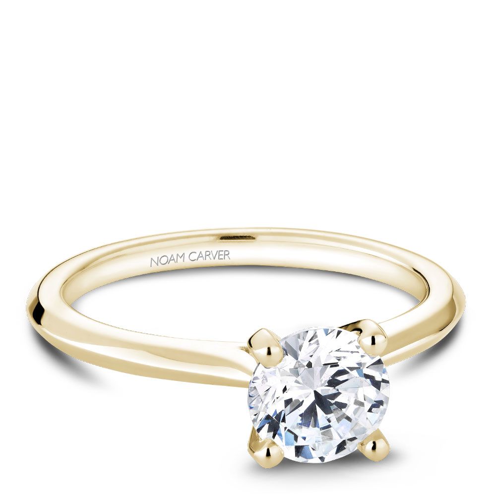 14K yellow gold solitaire engagement ring.