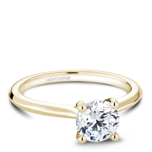 14K yellow gold solitaire engagement ring.