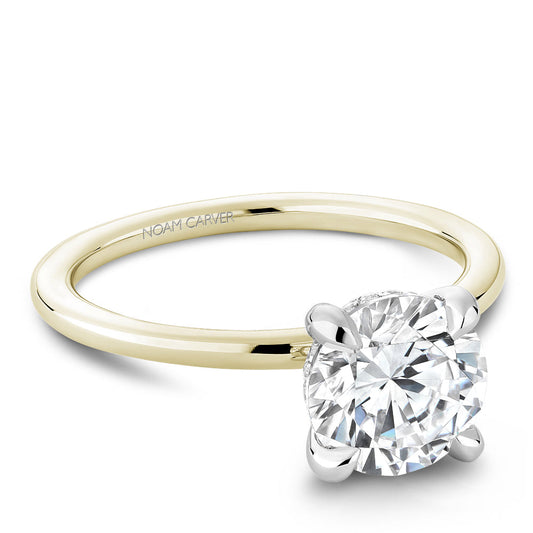 14K gold solitaire diamond ring with accents.