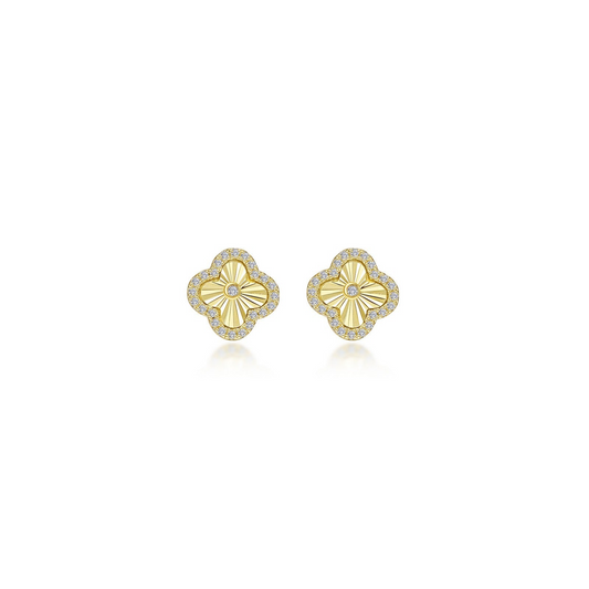 Yellow floral stud earrings with simulated diamonds.