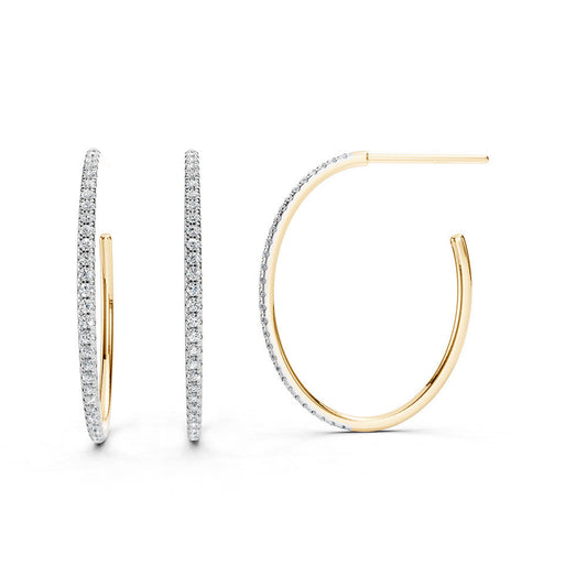 Diamond-accented yellow gold hoop earrings.