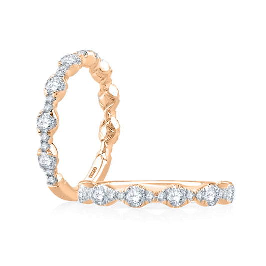 Rose gold band with round diamonds.