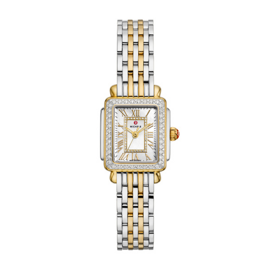 Gold and silver watch with diamond accents.