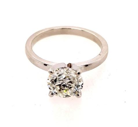 Solitaire diamond ring in 14K white gold.