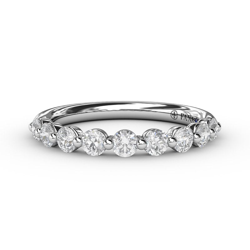 White gold band with round diamonds.