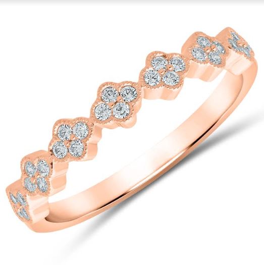 Rose gold band with diamond floral clusters.