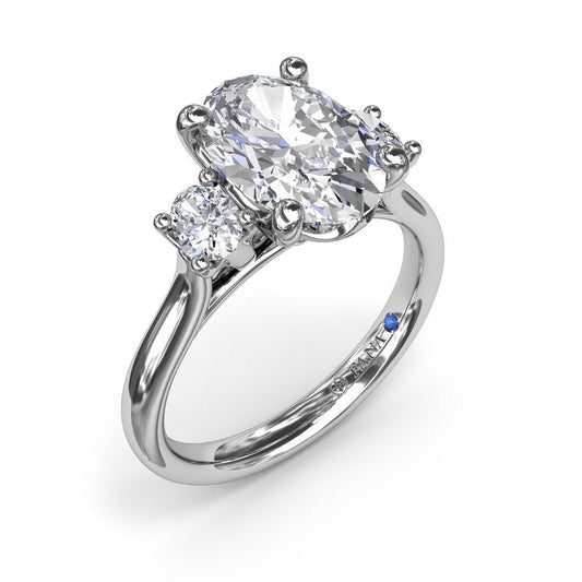 Three-stone diamond engagement ring in 14K tan.