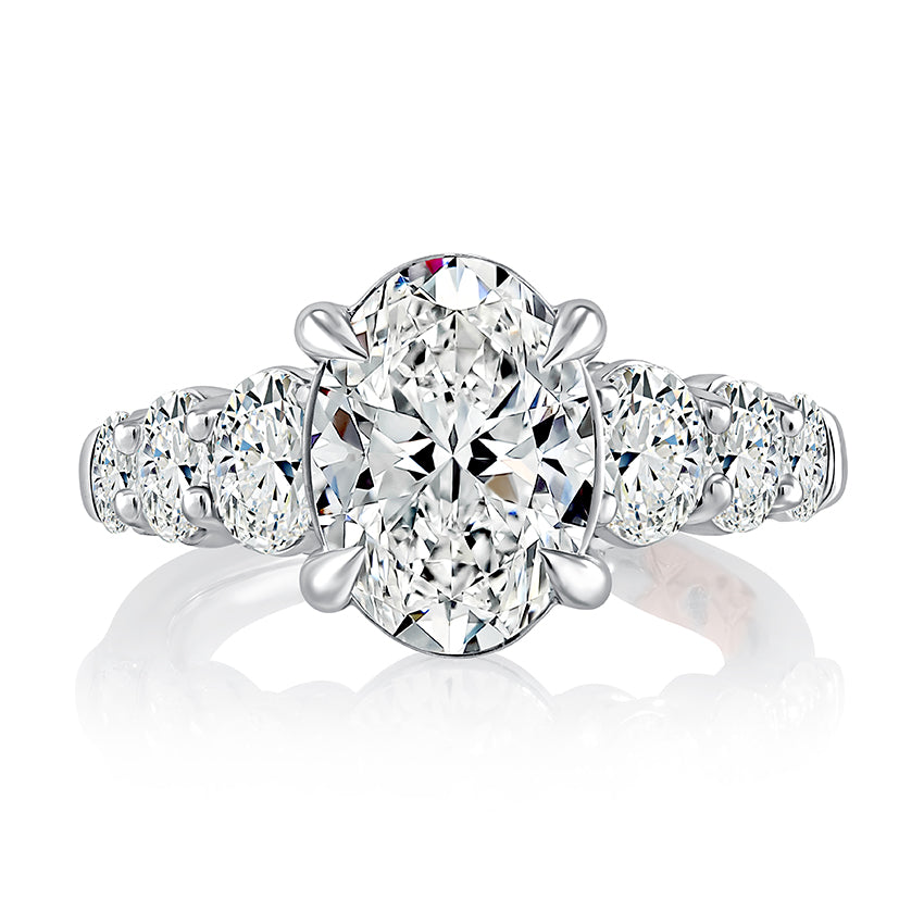 Oval diamond semi-mount ring, white gold.