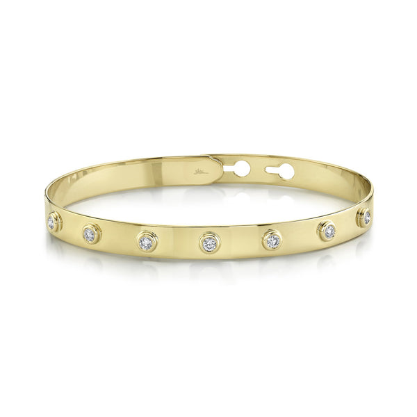 Yellow gold bracelet with round diamonds.