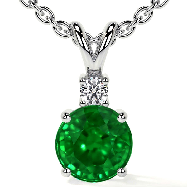 Emerald and diamond pendant on chain.