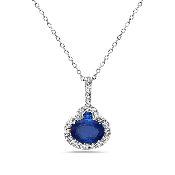 Blue sapphire pendant with diamond accents.