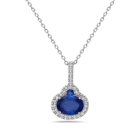 Blue sapphire pendant with diamond accents.
