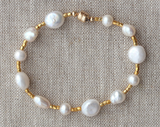 Gold-filled bracelet with white baroque pearls.