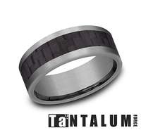 Tantalum band with carbon fiber inlay.