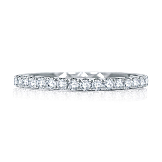 Stackable diamond band in white gold.