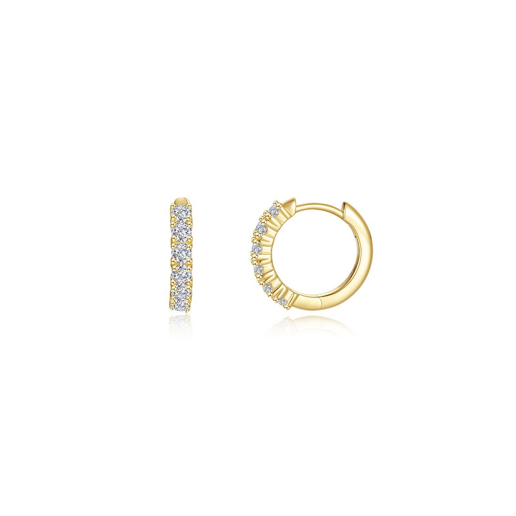 Yellow sterling silver huggie earrings with diamonds.