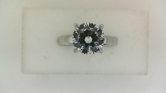 14K white gold ring with round diamond.