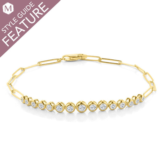 Yellow gold bracelet with round diamonds.