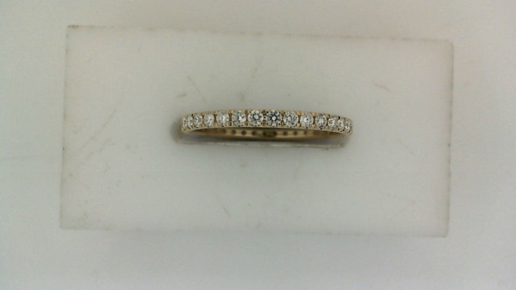 14K yellow gold band with round diamonds.