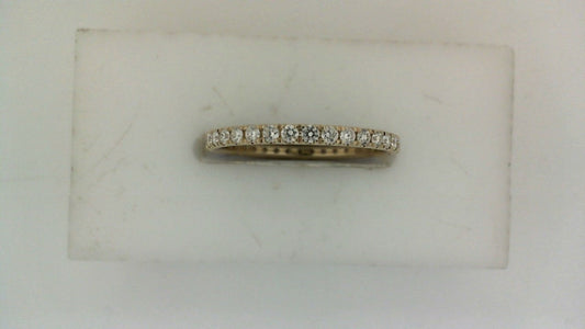 14K yellow gold band with round diamonds.